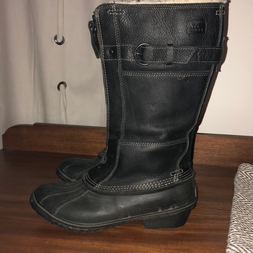Sorel size 10 Winter Fancy Tall black leather zip up winter boots. NL2136-010